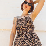 closeup girl wearing leopard button bust elastic waist midid dress 