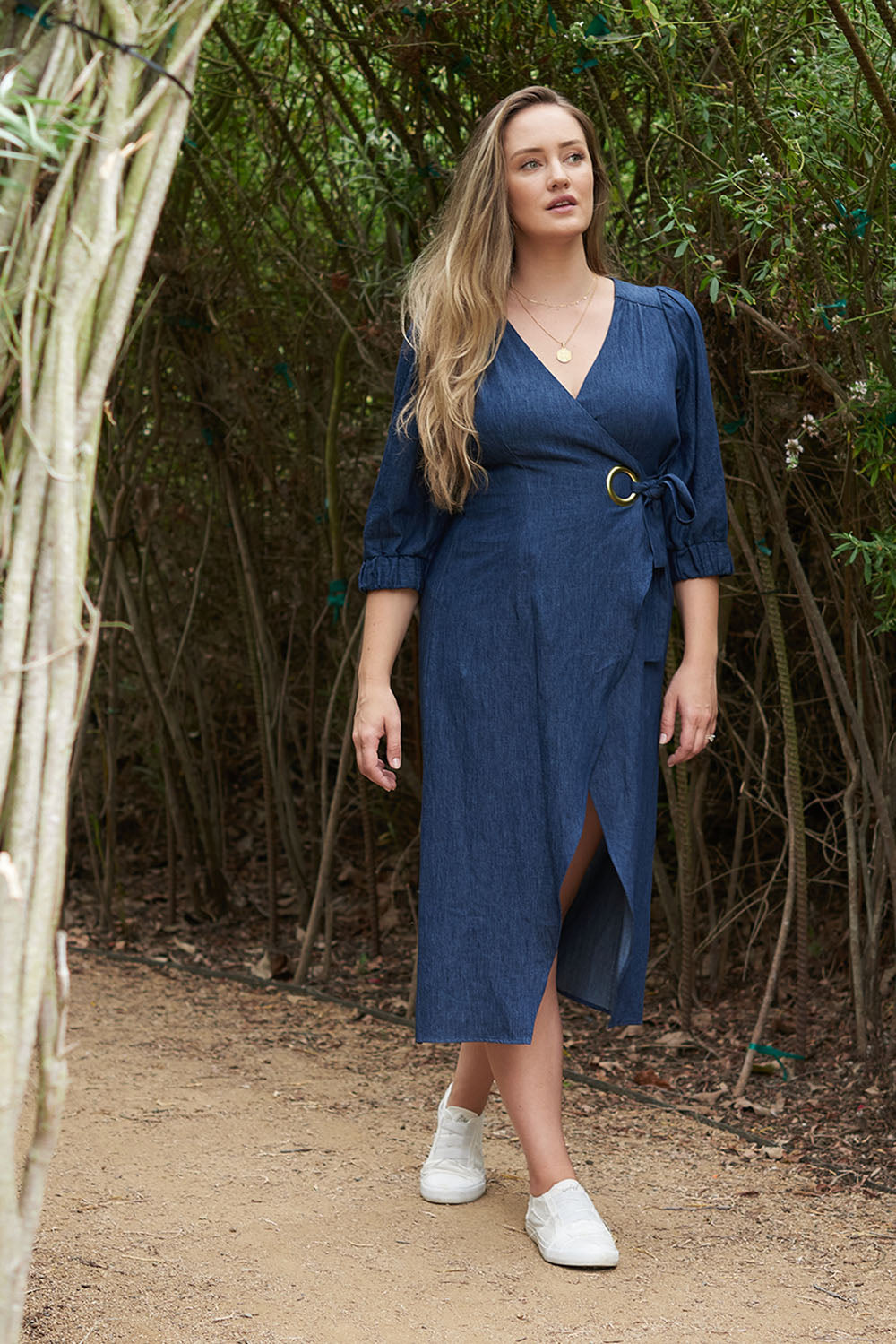 Achieve a feminine and chic style with our maternity wardrobe essentials, including the elegant ANDI adjustable wrap dress.