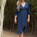 Achieve a feminine and chic style with our maternity wardrobe essentials, including the elegant ANDI adjustable wrap dress.