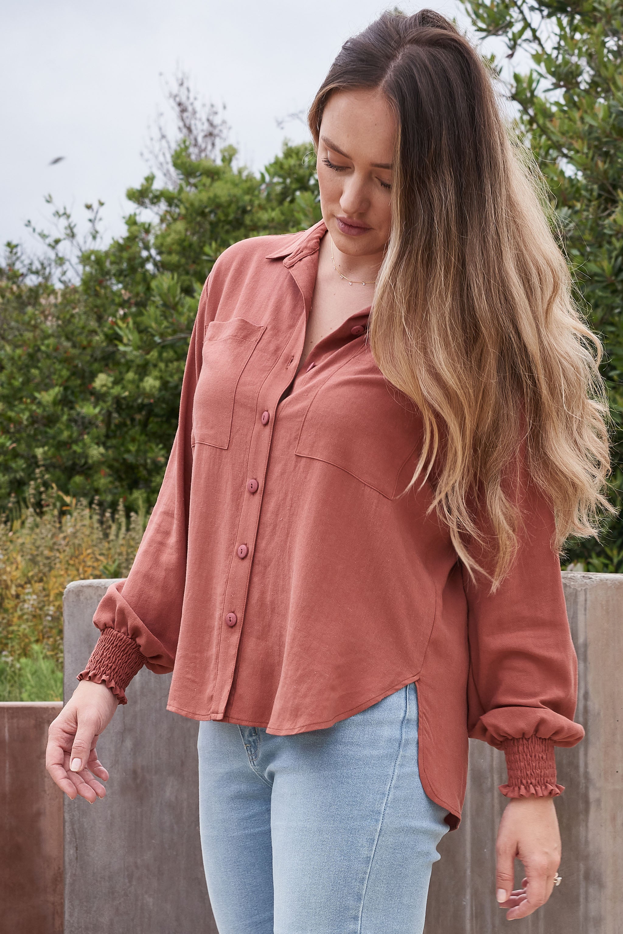 Effortless fashion for busy moms: make a statement with the trendy ARIA button-up top.
