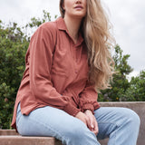 Nursing fashion meets style with the convenient ARIA button-up top for new moms.