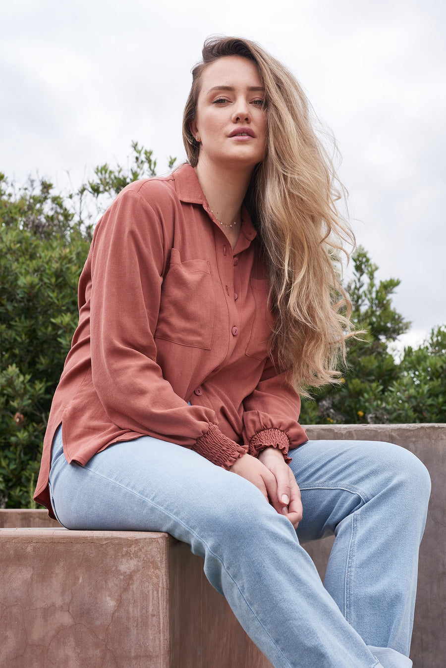 Nursing fashion meets style with the convenient ARIA button-up top for new moms.